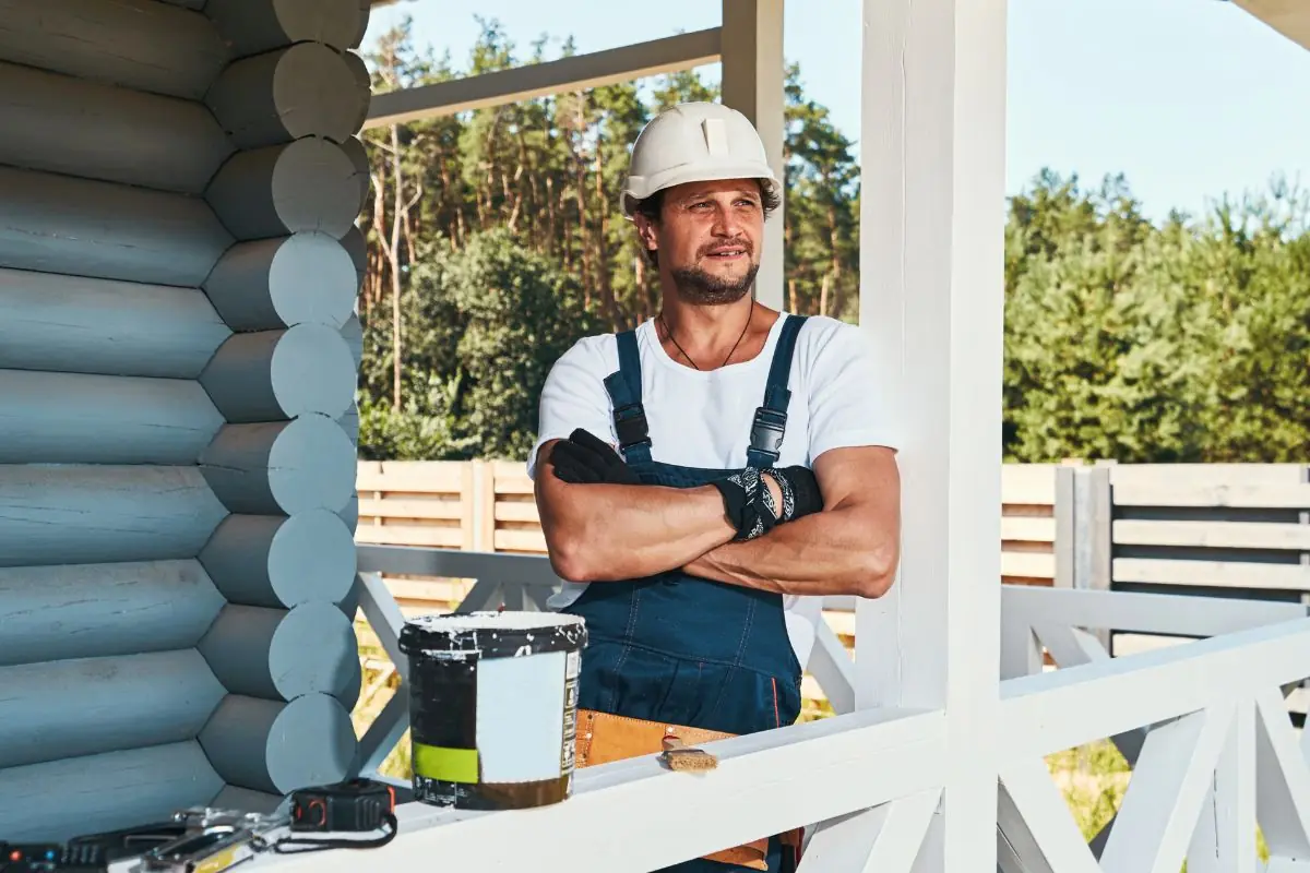 builder staring into distance from front porch