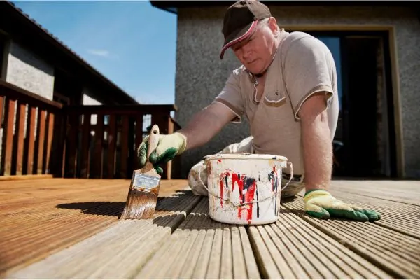 deck contractor restoring deck board