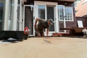 deck contractor building a ground level deck